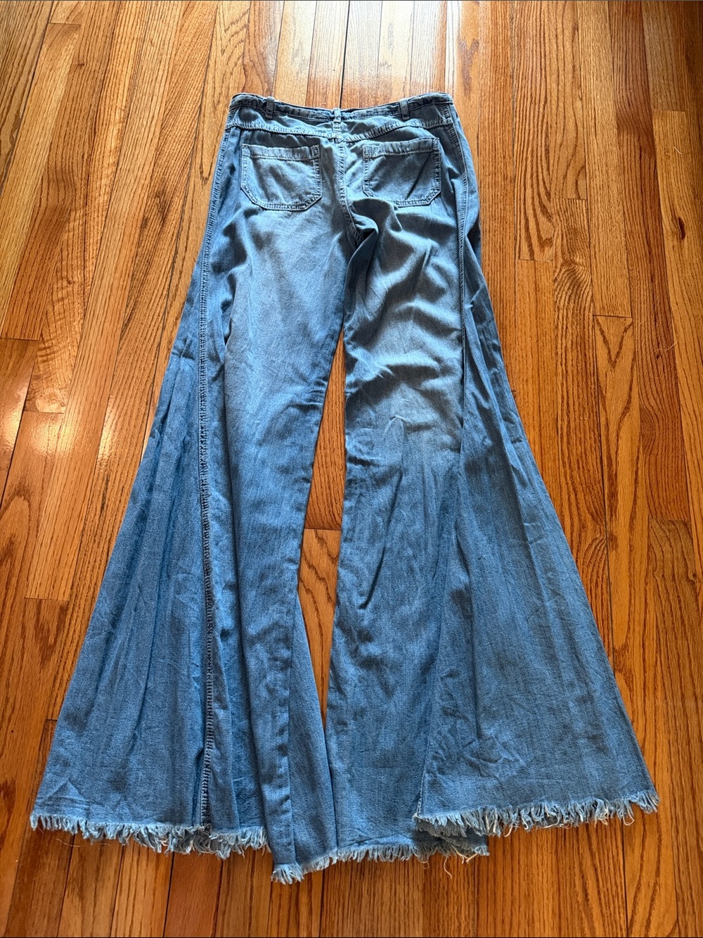 Free People Vintage Low Waist Ultra Wide-Leg Flare Jeans with Frayed Hem - Picture 7 of 9